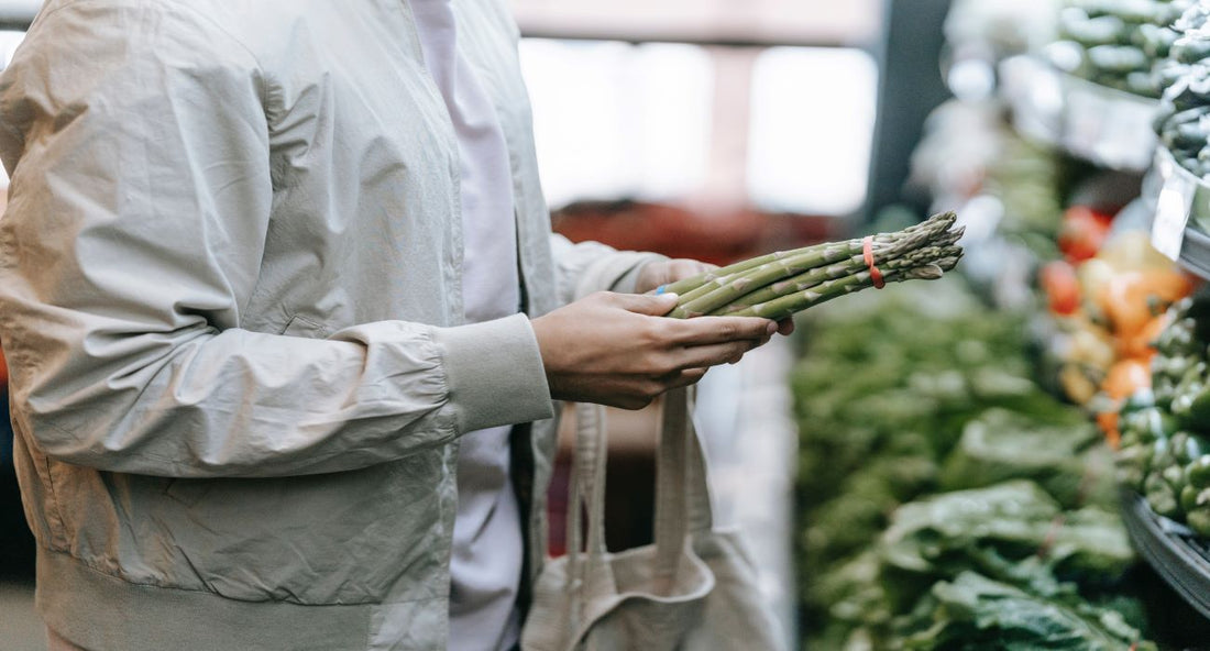 Man shopping asparagus