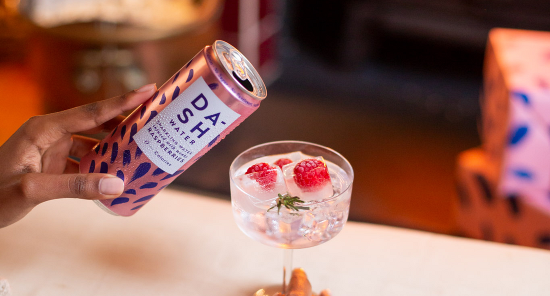 Winter spritz with DASH Water in front of a log fire
